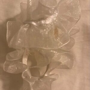 White lace pony tail holder or small bun/updo